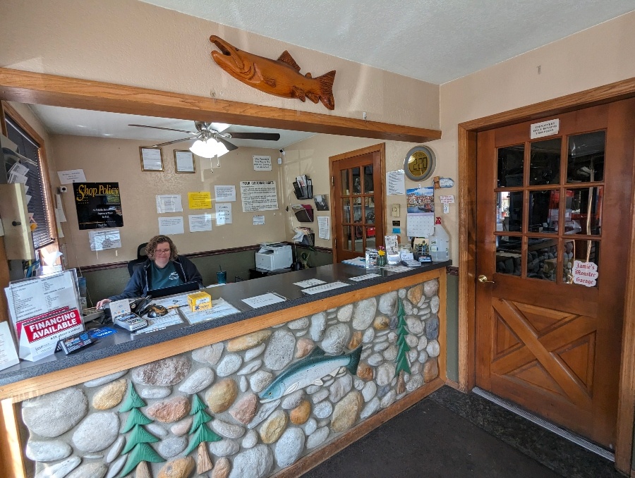 The lobby and river-rock front desk at Jamie's Transmission Service