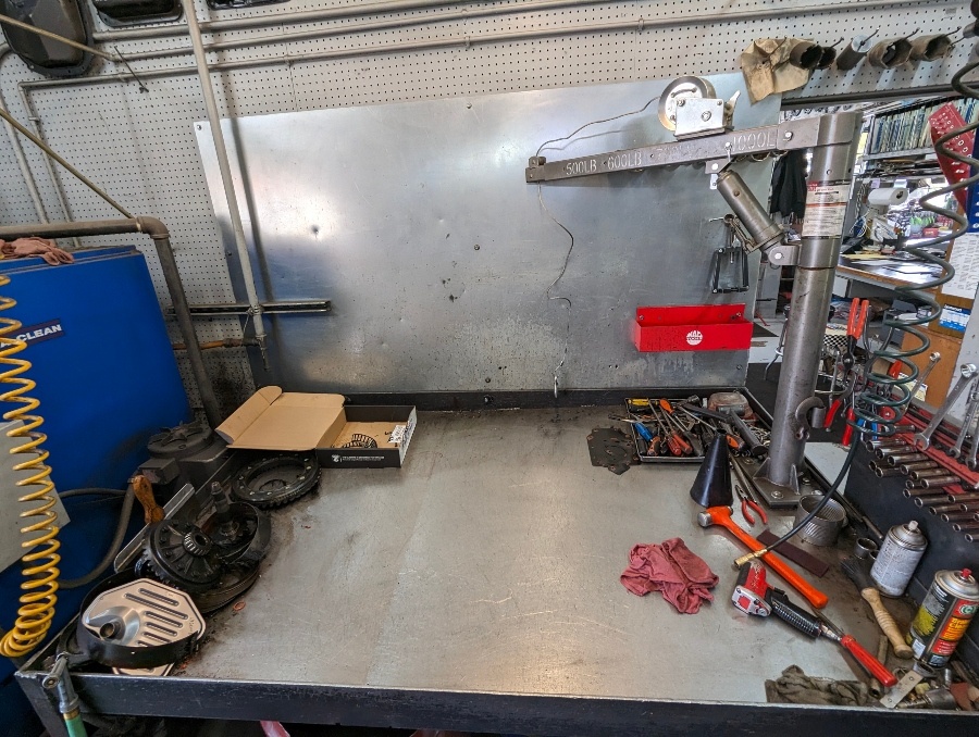 Workbench with a clutch and flywheel prepared for installation