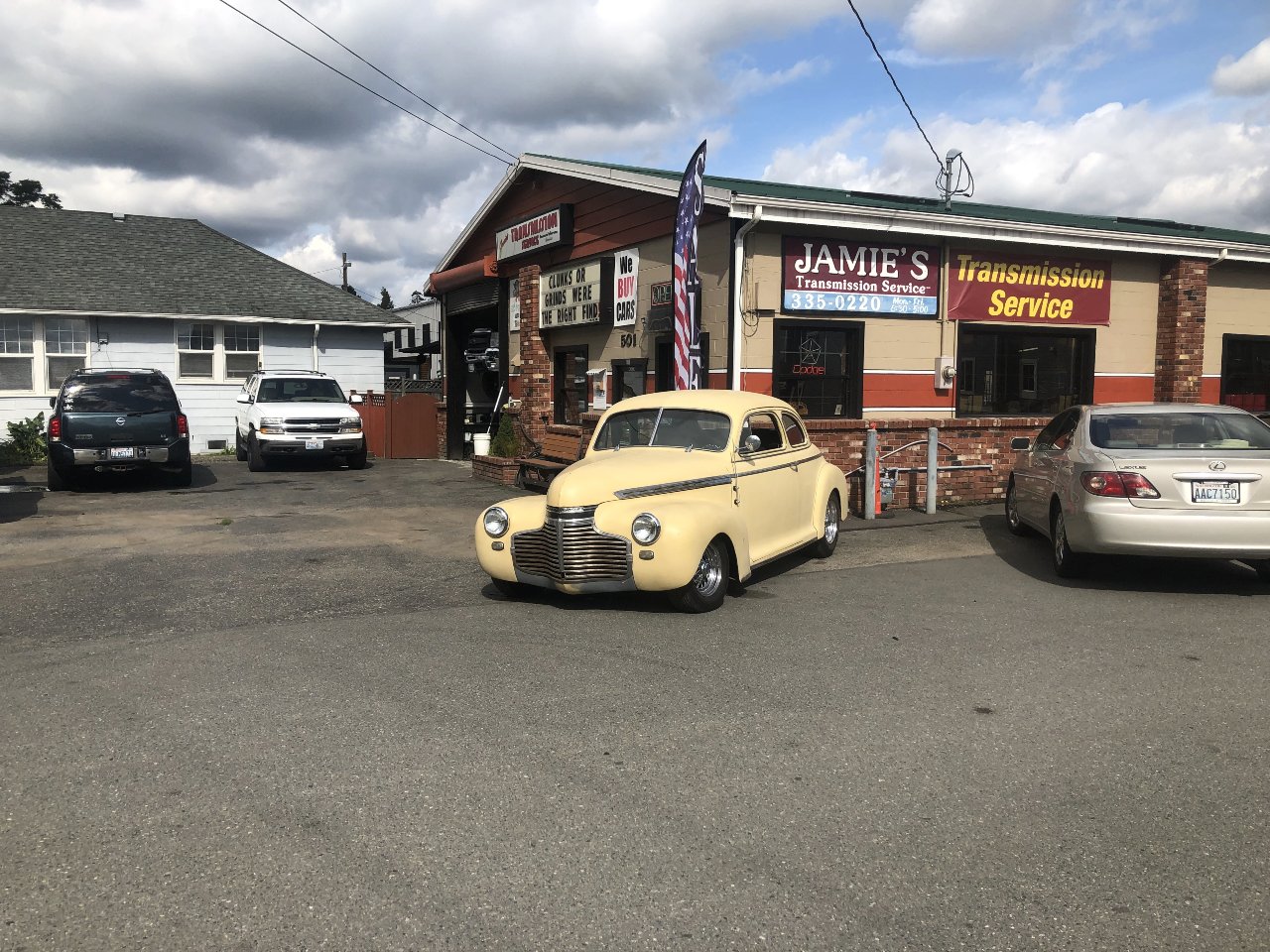 A 1941 Chevy coupe hot rod outside Jamie's Transmission Service